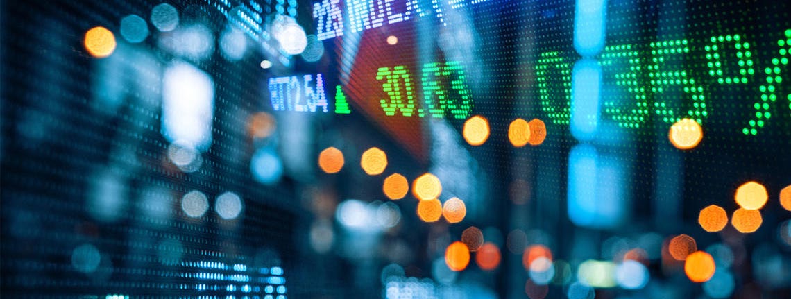 Un panel de mercados financieros con cotizaciones y variaciones en verde y rojo