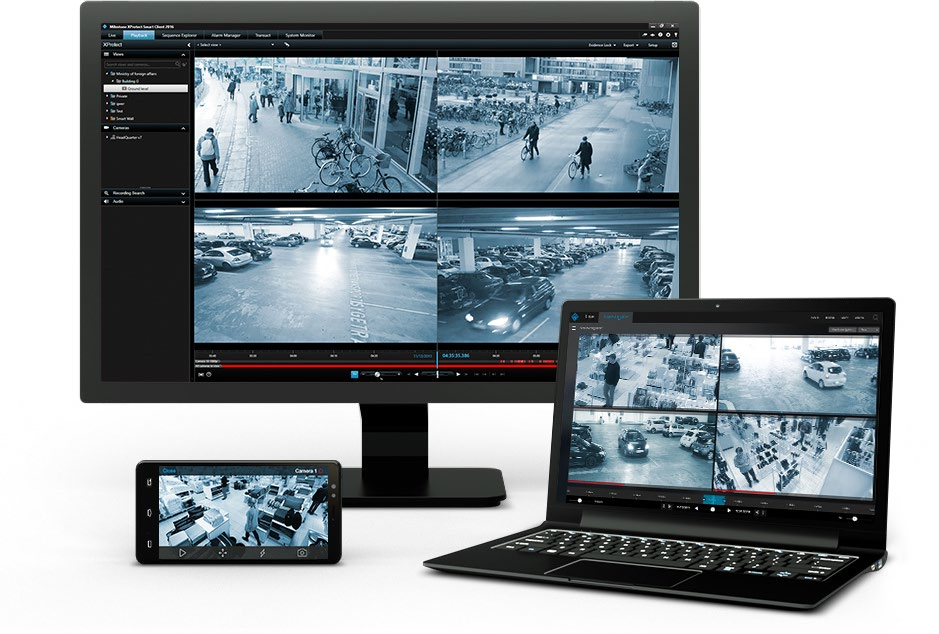 El software de gestión de vídeo Milestone XProtect mostrado en un monitor, un portátil y una tableta