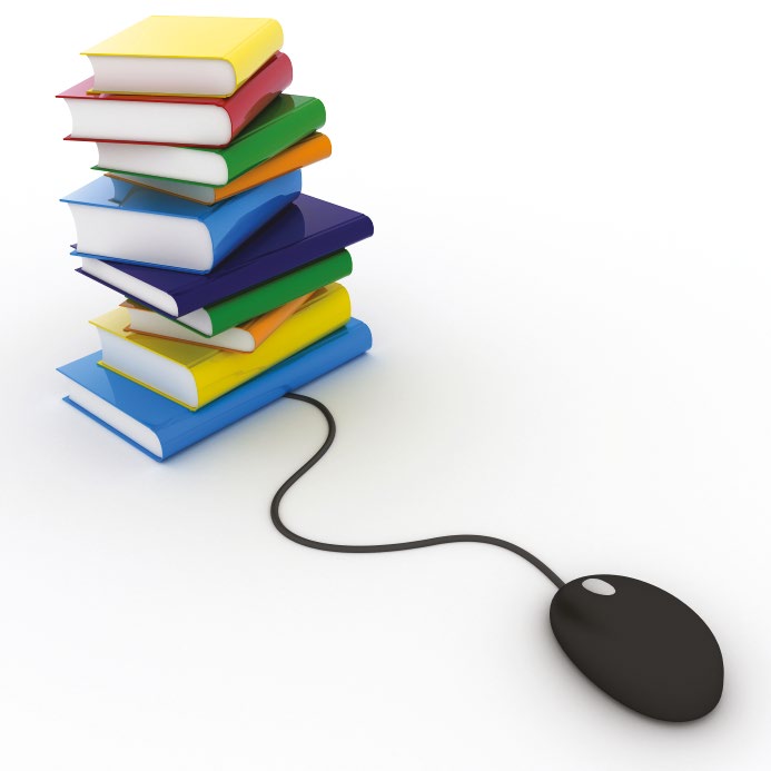 Una pila de libros de colores con el cable de un ratón de ordenador entrando en ella